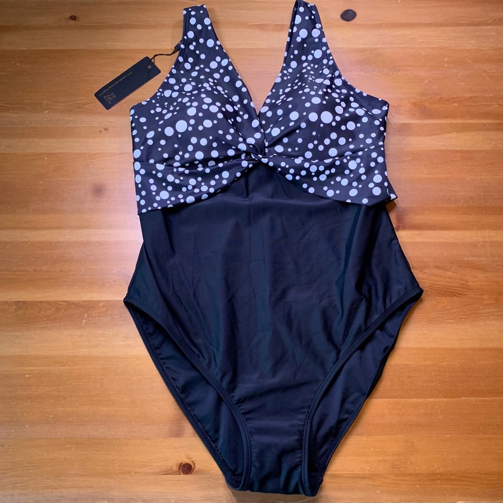 NWT One piece Black with white dots - Size L